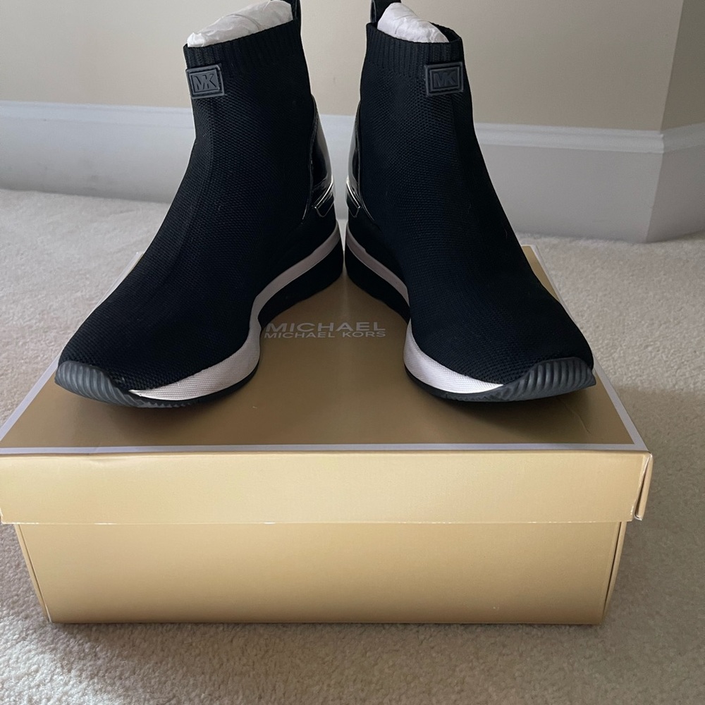 Slightly worn Michael Kors fabric bootie.